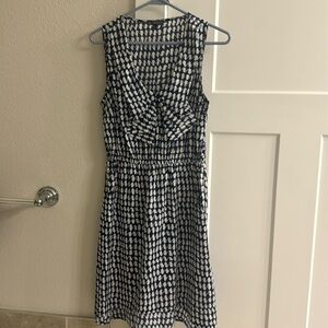 Lightweight medium dress with pockets. Navy blue and grayish white